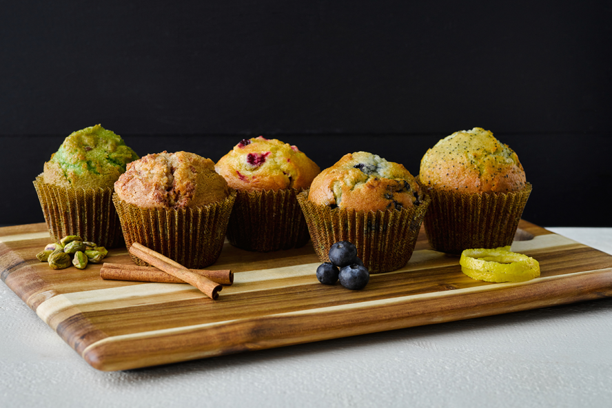 An assessment of Breakfast Muffins served on a wooden board